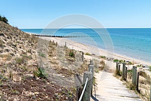 Wooden path with Atlantic Ocean view in Vendee on Noirmoutier isle France