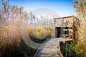 Wooden path in a bird observatory, in the wetlands natural park La Marjal in Pego and Oliva
