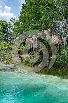 wooden path next to the rapids near bacalar lagoon, mexico