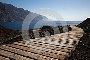 Wooden path at ocean - travel destinaton background