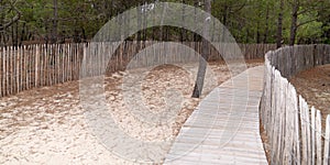 Wooden path to the beach in web banner template in Lacanau Gironde