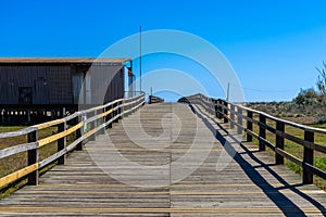 Wooden path to Manta Rota beach