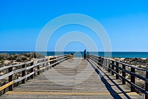 Wooden path to Manta Rota beach