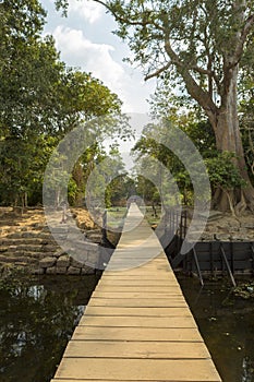 Wooden path to Neak Pean temple near Angkor Wat. Cambodia