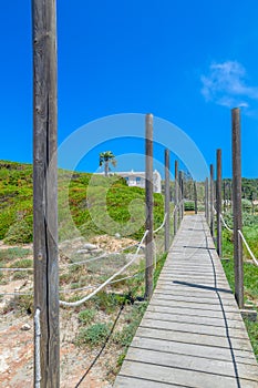 Wooden path to Playa de Son Bou Beach