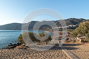 Wooden pathway to sandy beach at Palaiochora town at southern part of Crete island, Greece.