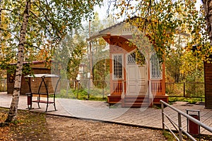 Wooden pavilion above a mineral spring in the mud spa resort of Marcial Waters in Karelia, Russia photo