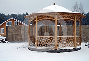 Wooden pavilion in the yard