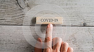 Wooden peg with Covid 19 sign