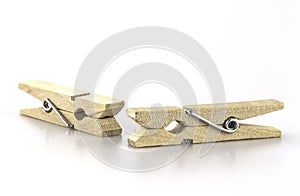 Wooden peg pins isolated  on white background.