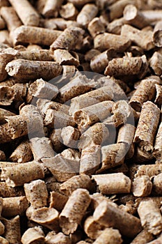 Wooden pellets in two wicker boxes. Biomass fuel