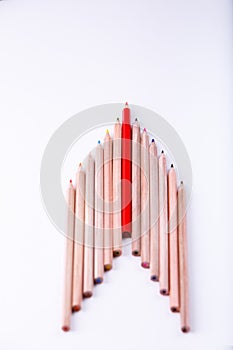 The wooden pencil arrange as head of arrow with one different as a symbol of difference concept