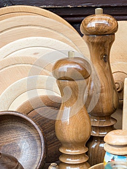 Wooden pepper mills and wooden plates