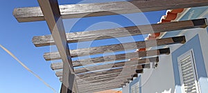 Wooden Pergola with blue sky background