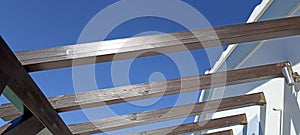 Wooden Pergola with blue sky background