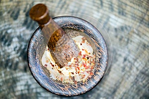 Wooden pestle with grits