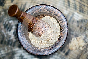 Wooden pestle with grits