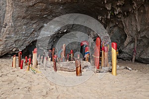 Wooden phalluses in Princess cave. Railay. Thailand