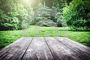 Wooden picnic table in forest