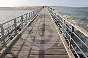 Wooden pier and Atlantic Ocean, Denmark, Europe.