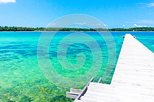 Wooden Pier and blue sea with blue sky in thailand