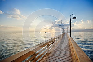 Wooden pier and boardwalk over ocean