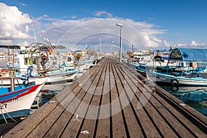 Wooden pier and boats at Larnaca marina, Cyprus
