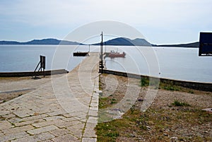 The wooden pier of Cala Reale in the island of Asinara