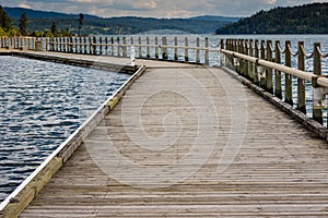 Wooden pier or dock extending into a lake