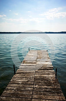 Wooden pier at Drawsko lake, maximum depth of 80 m makes it the second deepest lake in Poland