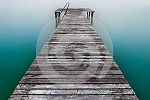 Wooden pier or jetty on lake