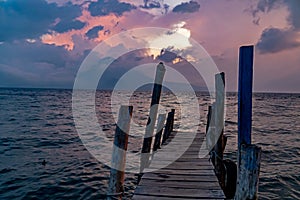 Wooden pier Lake AtitlÃÂ¡n, Guatemala photo