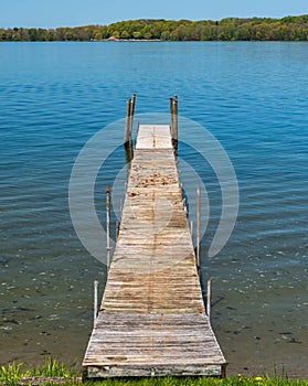 A wooden pier into Lake Chautauqua in Beemus Point, New York, USA