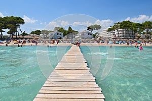 Wooden pier on Playa de Muro beach on Mallorca