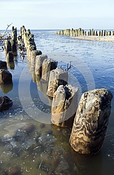 Wooden pier with poles