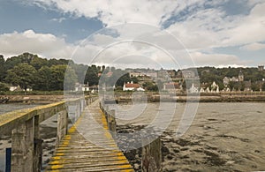 Wooden pier reaching out in to the Firth of Forth