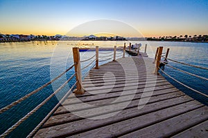 Wooden Pier on Red Sea in Hurghada at sunset, Egypt - travel destination in Africa