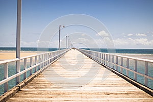 Wooden pier in Urangan photo