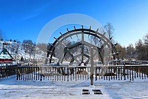 A wooden pier at winter day