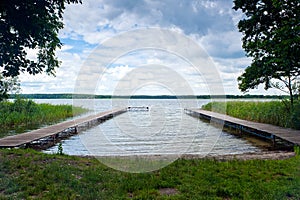 Wooden piers int Dominicke Lake, Boskowo City, Poland photo