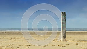 Wooden pillar at the beach 4K