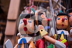 Wooden pinocchio dolls with his long nose