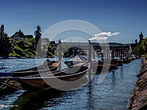 Wooden pirogues waiting on the Rhein