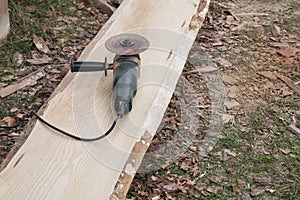 Wooden plank of pine without peel before abrading process