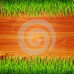 Wooden planks with green grass background