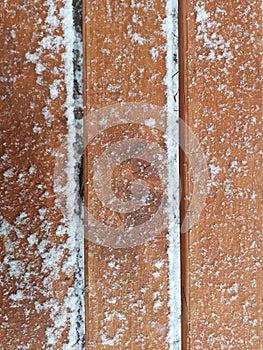 Wooden planks in the snow