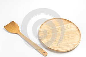Wooden plate or tray with flipper or spade isolated white background