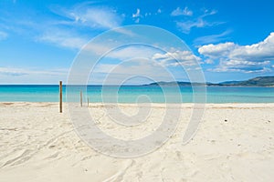 Wooden poles in Maria Pia beach photo