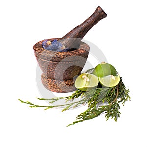 Wooden pounder with flowers and lime isolated photo