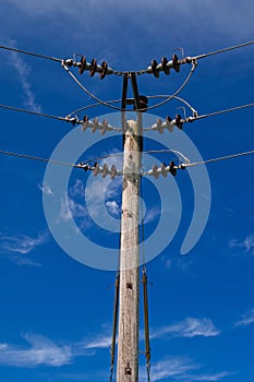 Wooden Power Electricity Pole Pylon,High Volage,Blue Sky Background
